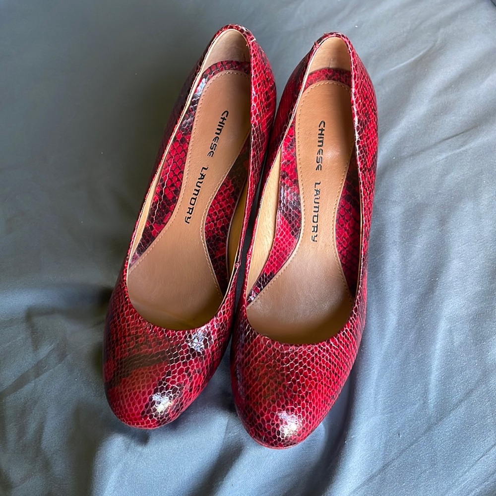 Red faux snake skin heels